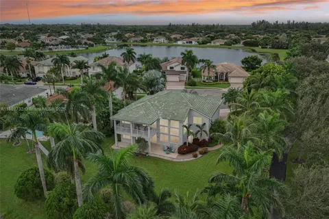 a view of a backyard with garden and plants