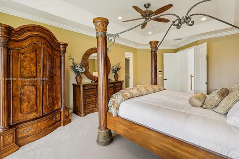 a living room with furniture a fireplace and a window