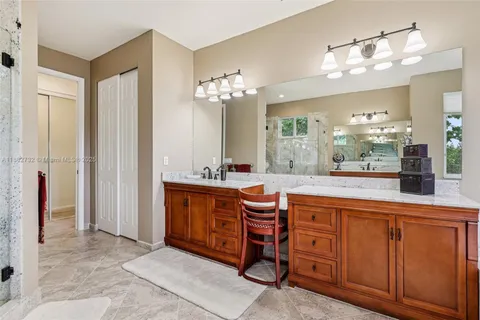 a view of a house with swimming pool and porch