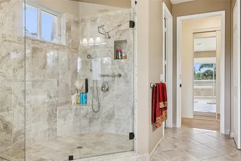 a garden with trees in the background