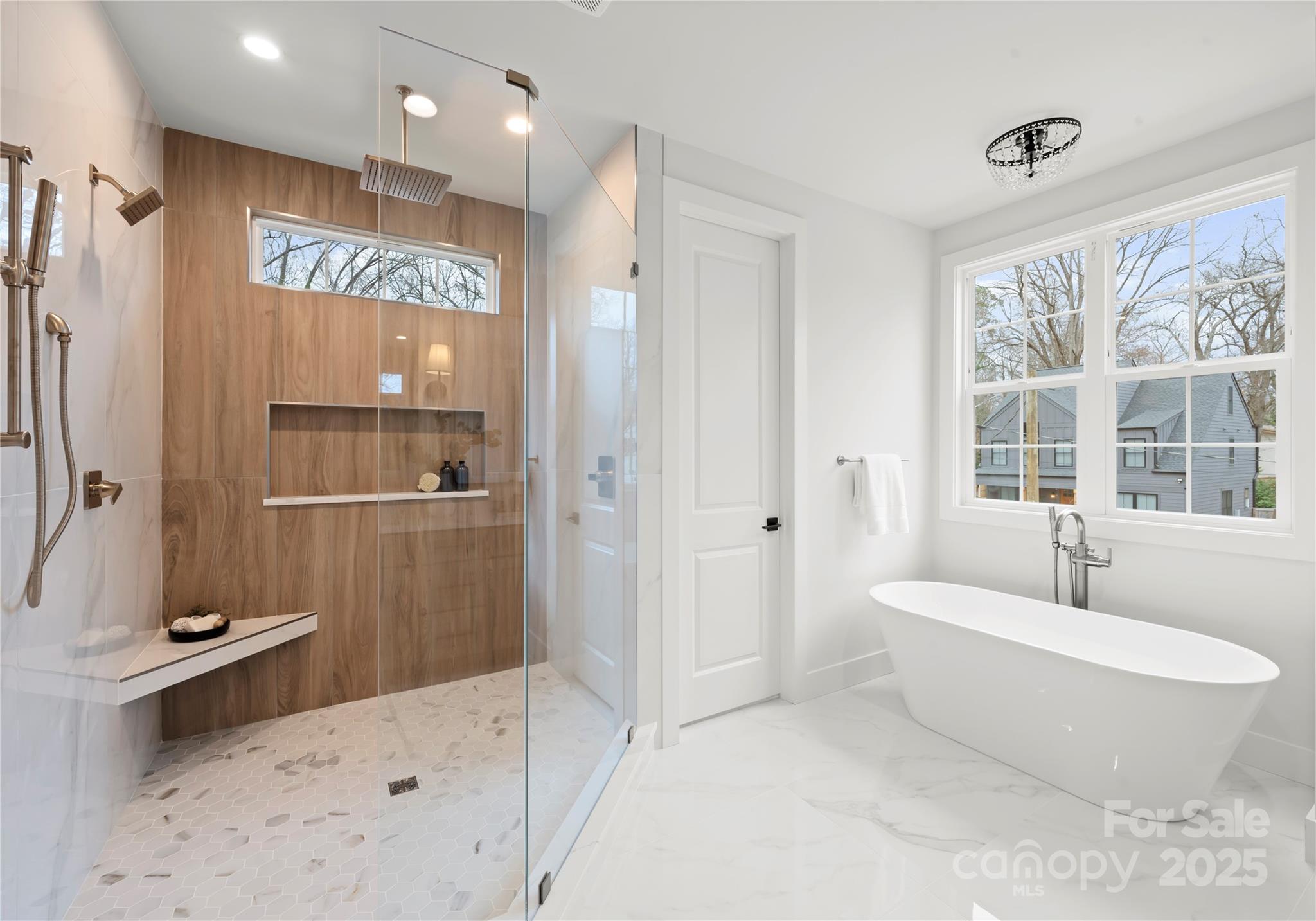 1641 Longfellow Street Charlotte, NC 28205 - Photo 33 of 48 a spacious bathroom with a tub shower and sink
