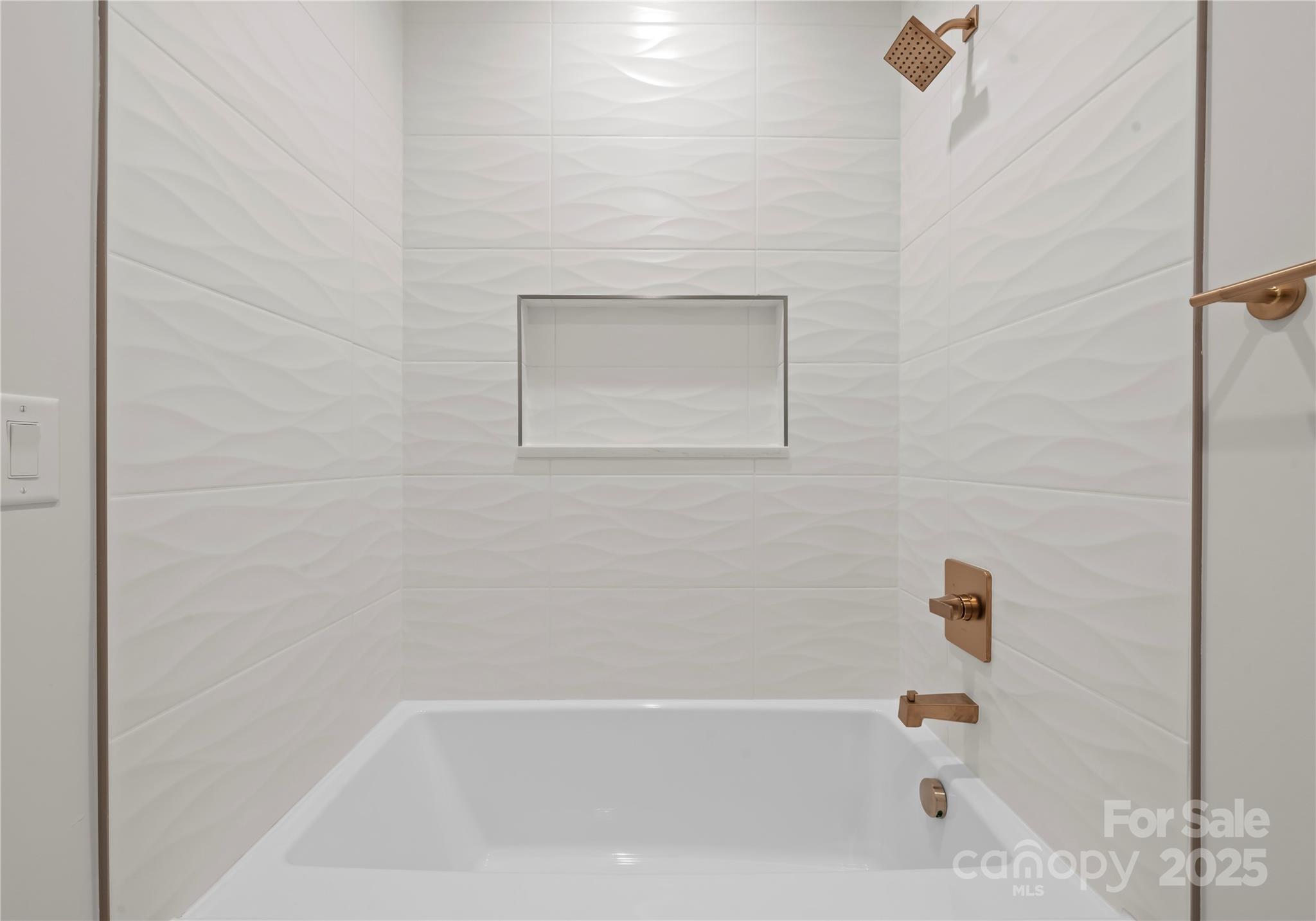 1641 Longfellow Street Charlotte, NC 28205 - Photo 40 of 48 a bathroom with a bathtub