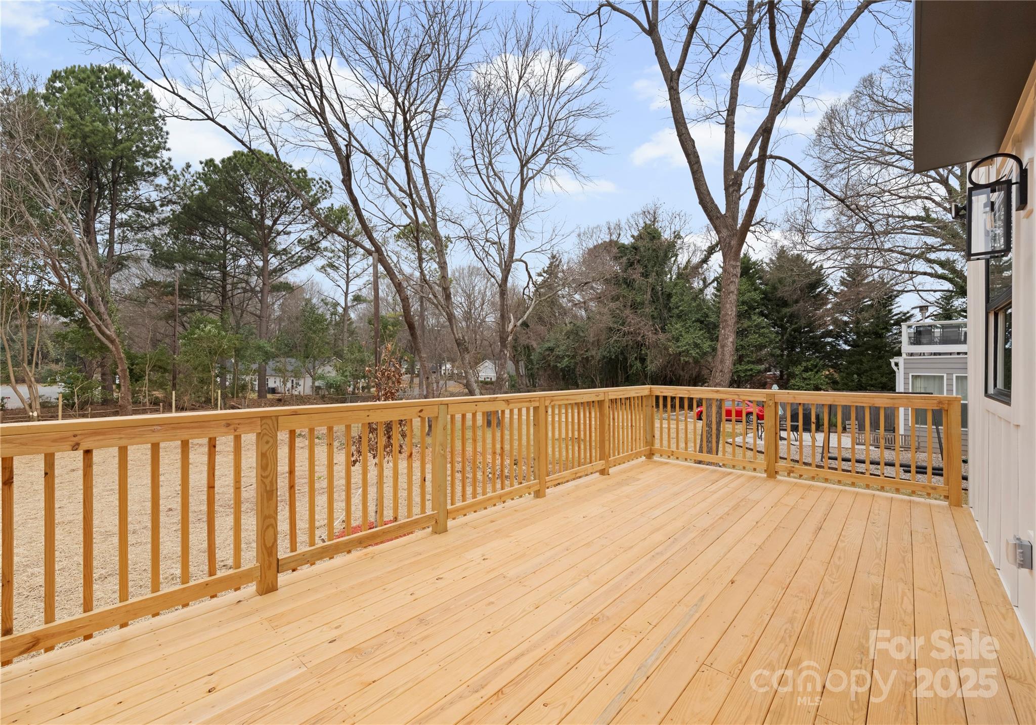 1641 Longfellow Street Charlotte, NC 28205 - Photo 46 of 48 a view of balcony with wooden floor and fence