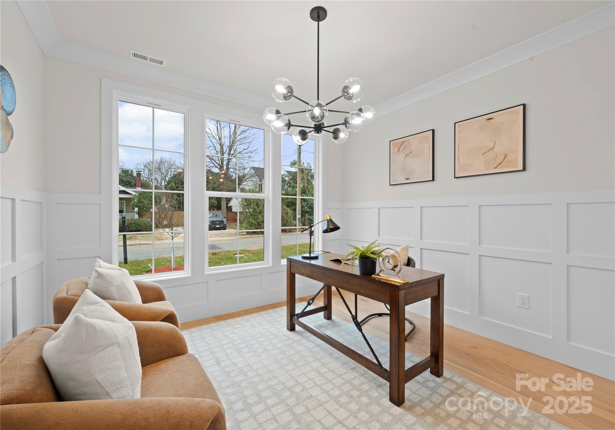 1641 Longfellow Street Charlotte, NC 28205 - Photo 8 of 48 a living room with furniture and a large window