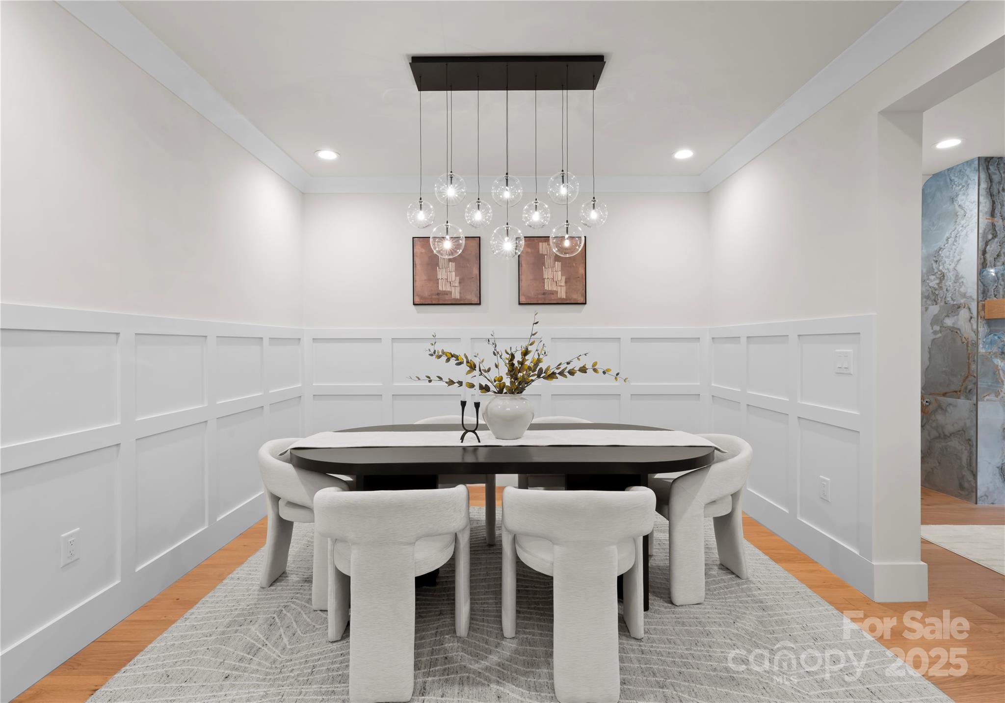 1641 Longfellow Street Charlotte, NC 28205 - Photo 10 of 48 a view of a dining room with furniture and wooden floor