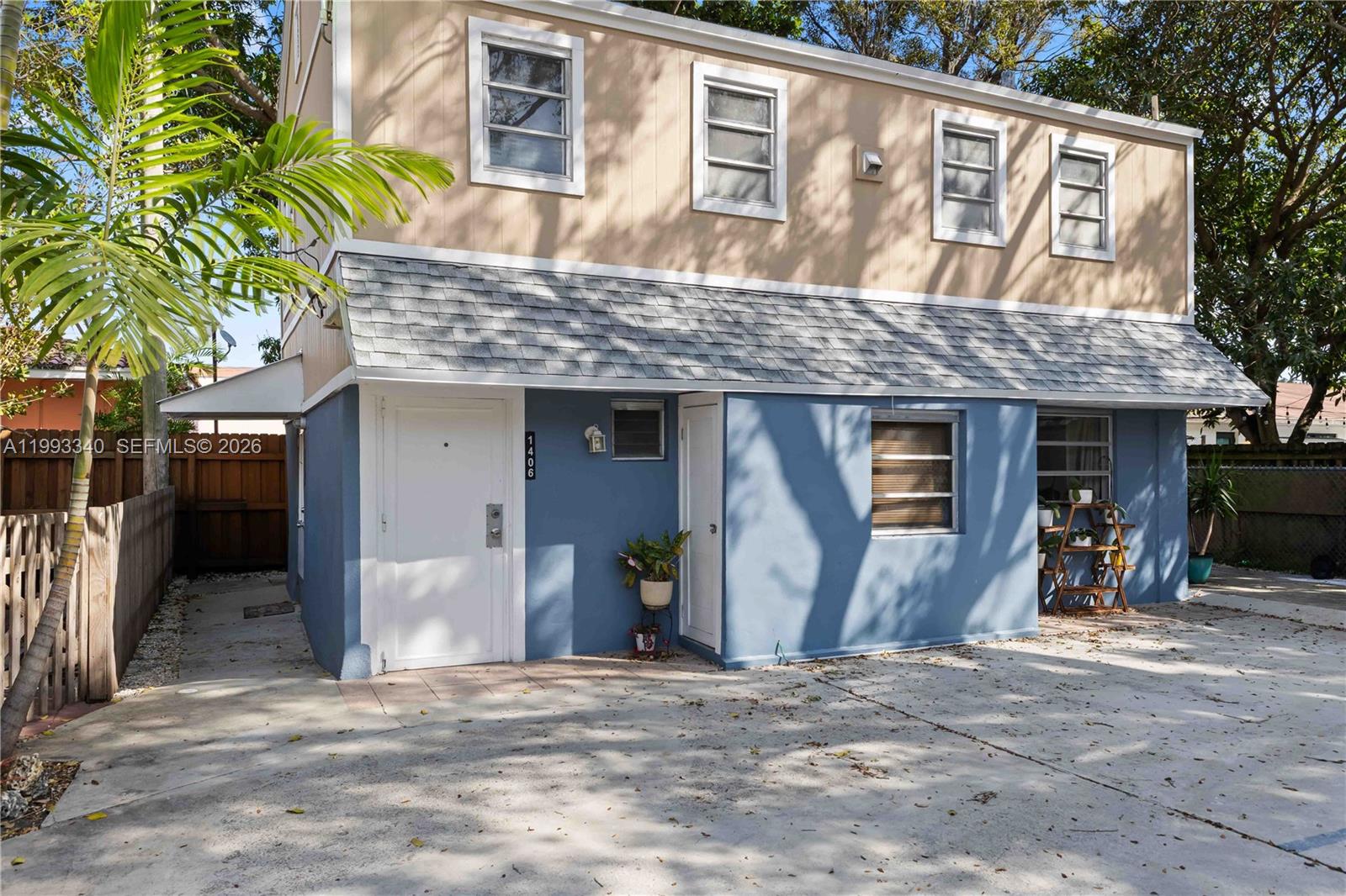 1408 Southwest 19th Terrace, Unit 1406 Miami, FL 33145 - Photo 11 of 12 a view of a house with a patio