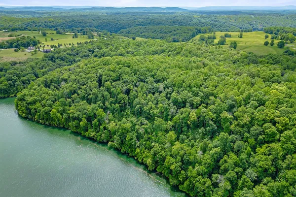a view of a field with an outdoor space