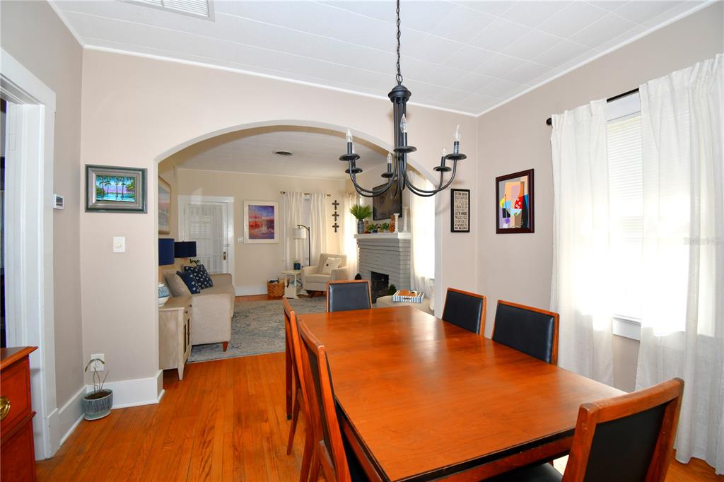 1245 Alexander Street Mount Dora, FL 32757 - Photo 15 of 55 a view of a dining room with furniture