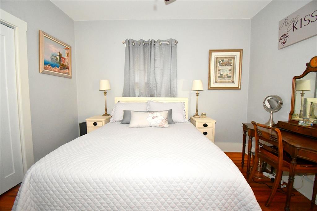 1245 Alexander Street Mount Dora, FL 32757 - Photo 26 of 55 a bedroom with bed and wooden floor