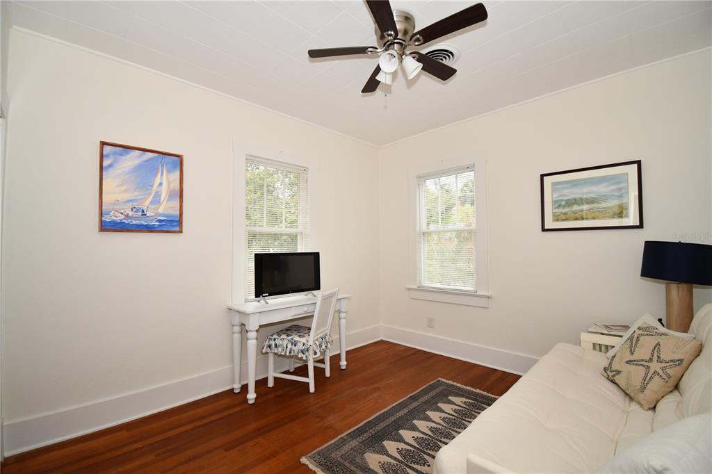 1245 Alexander Street Mount Dora, FL 32757 - Photo 27 of 55 a bedroom with furniture and a window