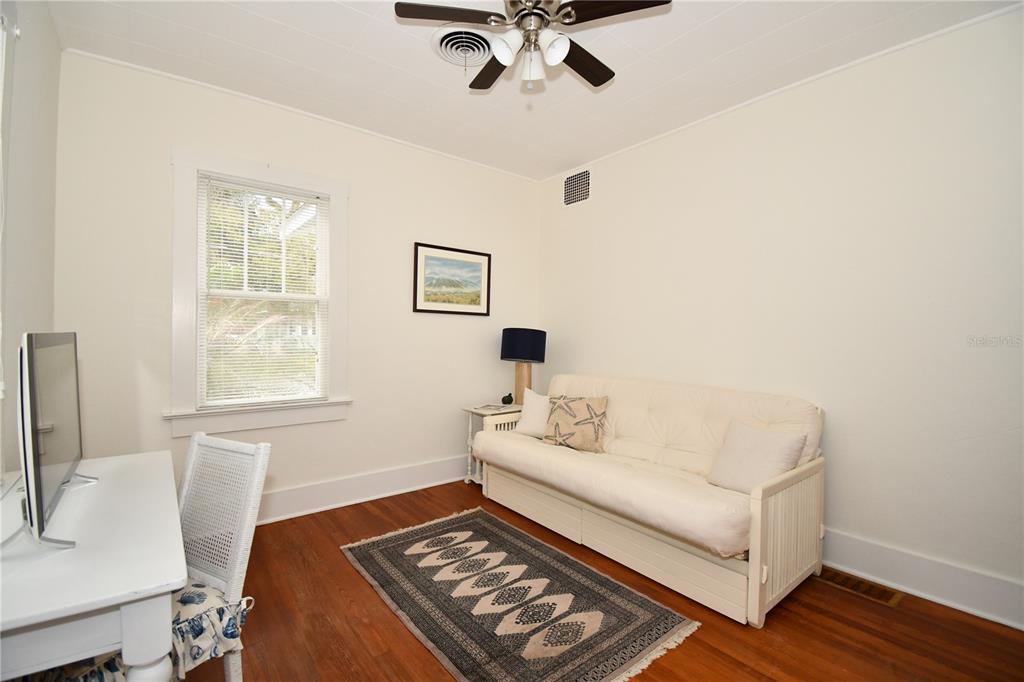 1245 Alexander Street Mount Dora, FL 32757 - Photo 28 of 55 a living room with furniture and a window