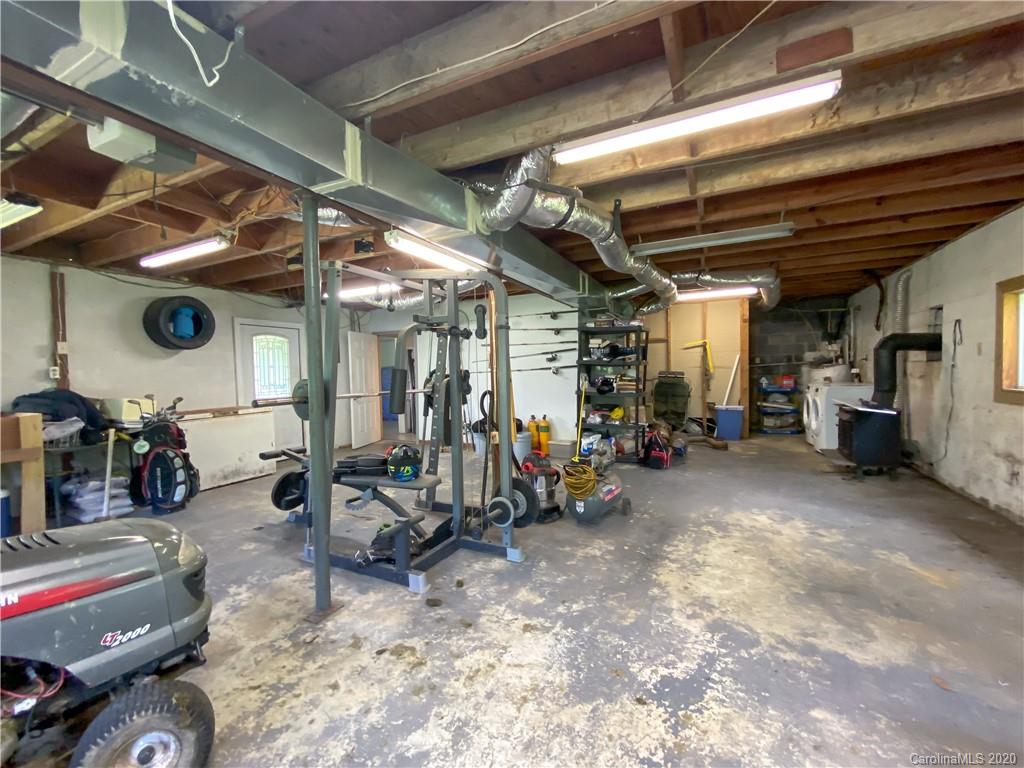 93 Swiss Valley Road Clyde, NC 28721 - Photo 22 of 28 a view of a room with gym equipment