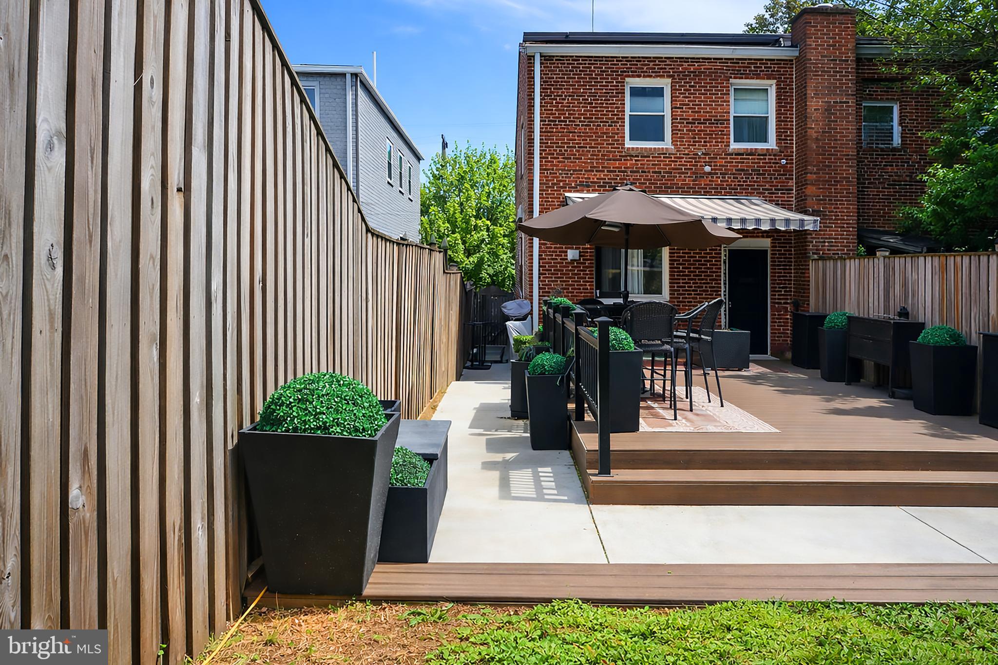 3935 Clay Place Northeast Washington, DC 20019 - Photo 16 of 17 a front view of a house with patio