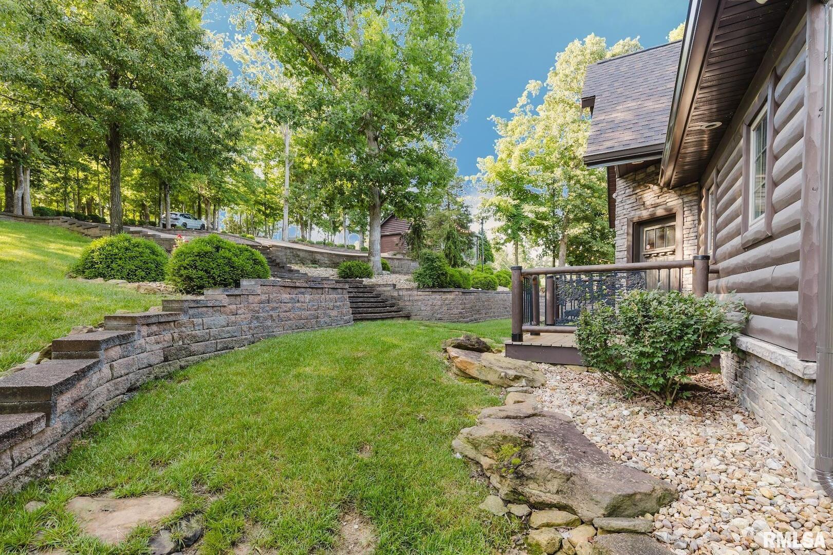 3525 Parrish Ridge Lane Goreville, IL 62939 - Photo 14 of 86 a backyard of a house with lots of green space
