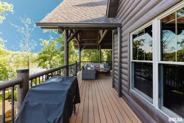 a kitchen with stainless steel appliances granite countertop a refrigerator and a stove