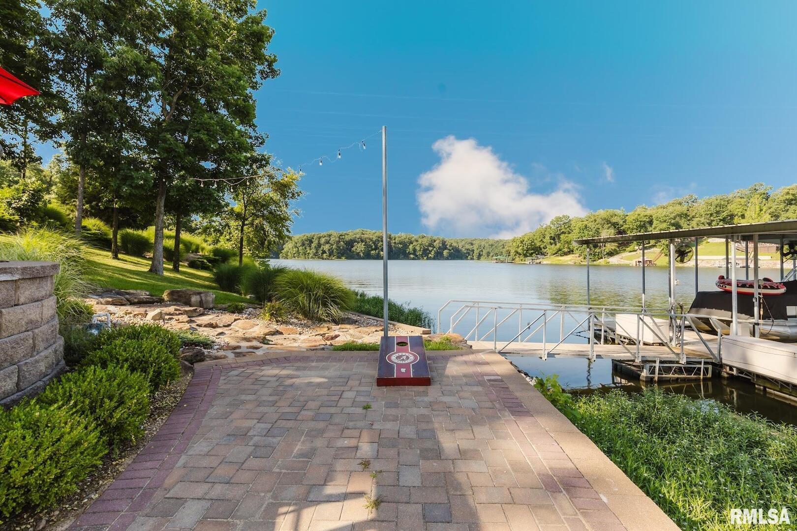 3525 Parrish Ridge Lane Goreville, IL 62939 - Photo 23 of 86 a view of a patio with chairs and a fire pit