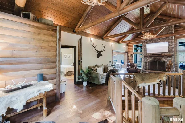 a bathroom with a double vanity sink a mirror and shower
