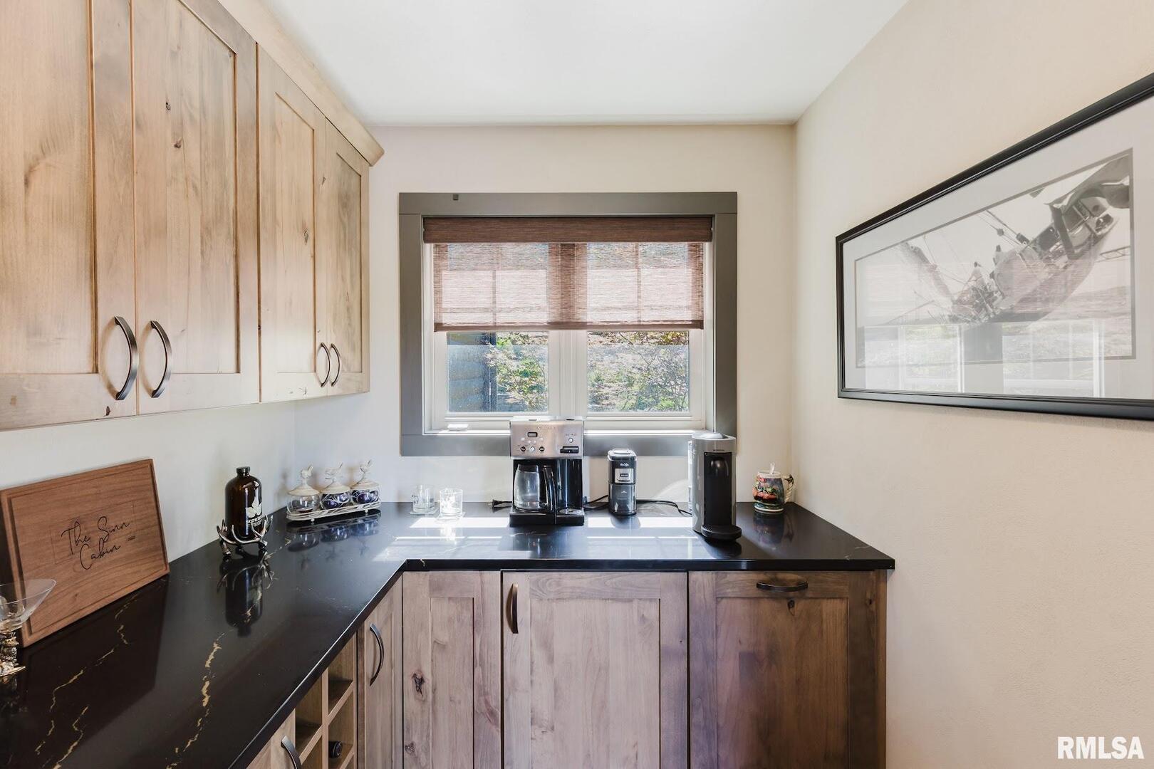 3525 Parrish Ridge Lane Goreville, IL 62939 - Photo 43 of 86 a kitchen with a window a sink and cabinets