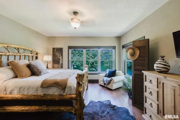 a view of a patio with chairs and a yard