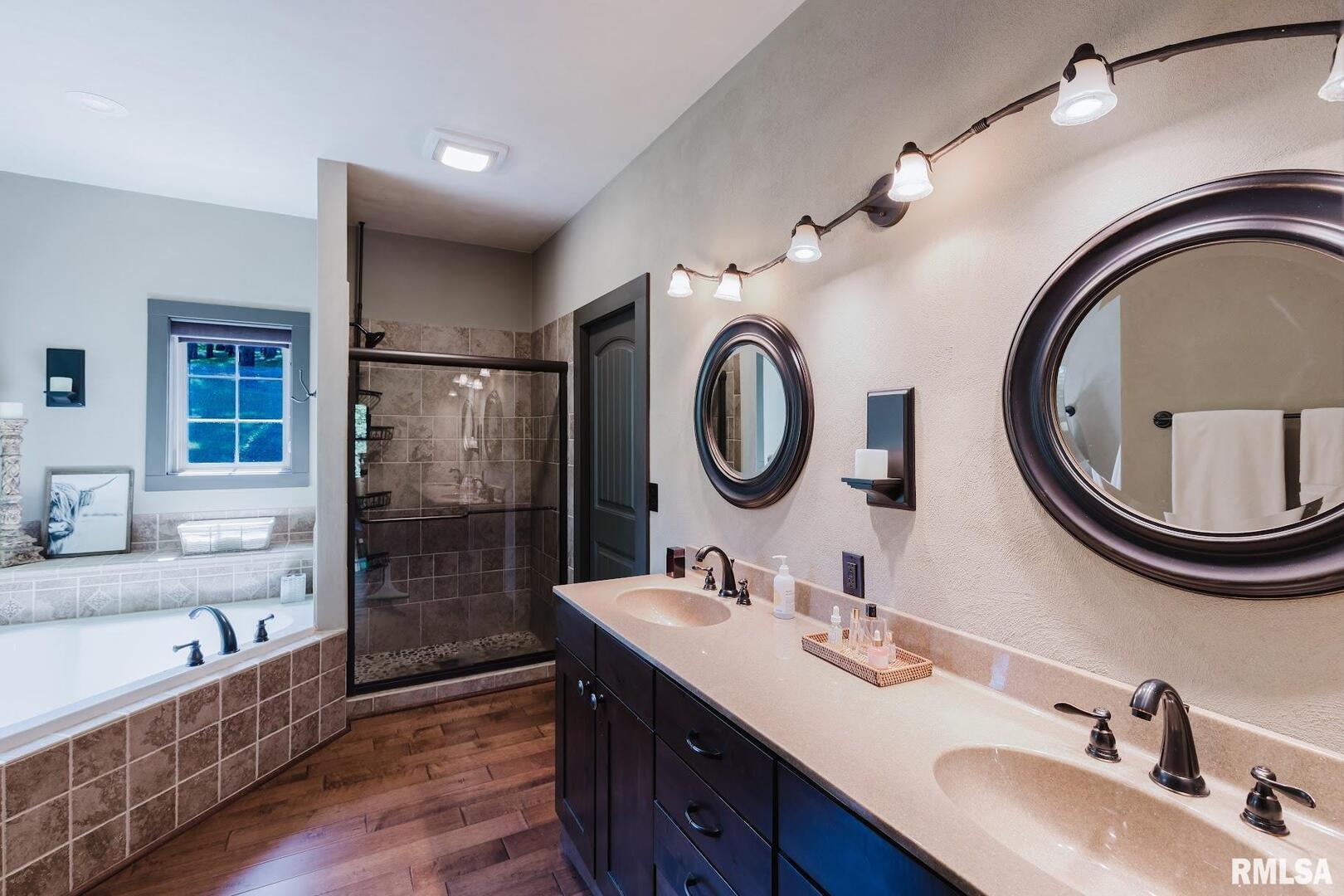 3525 Parrish Ridge Lane Goreville, IL 62939 - Photo 48 of 86 a bathroom with a sink double vanity and a mirror