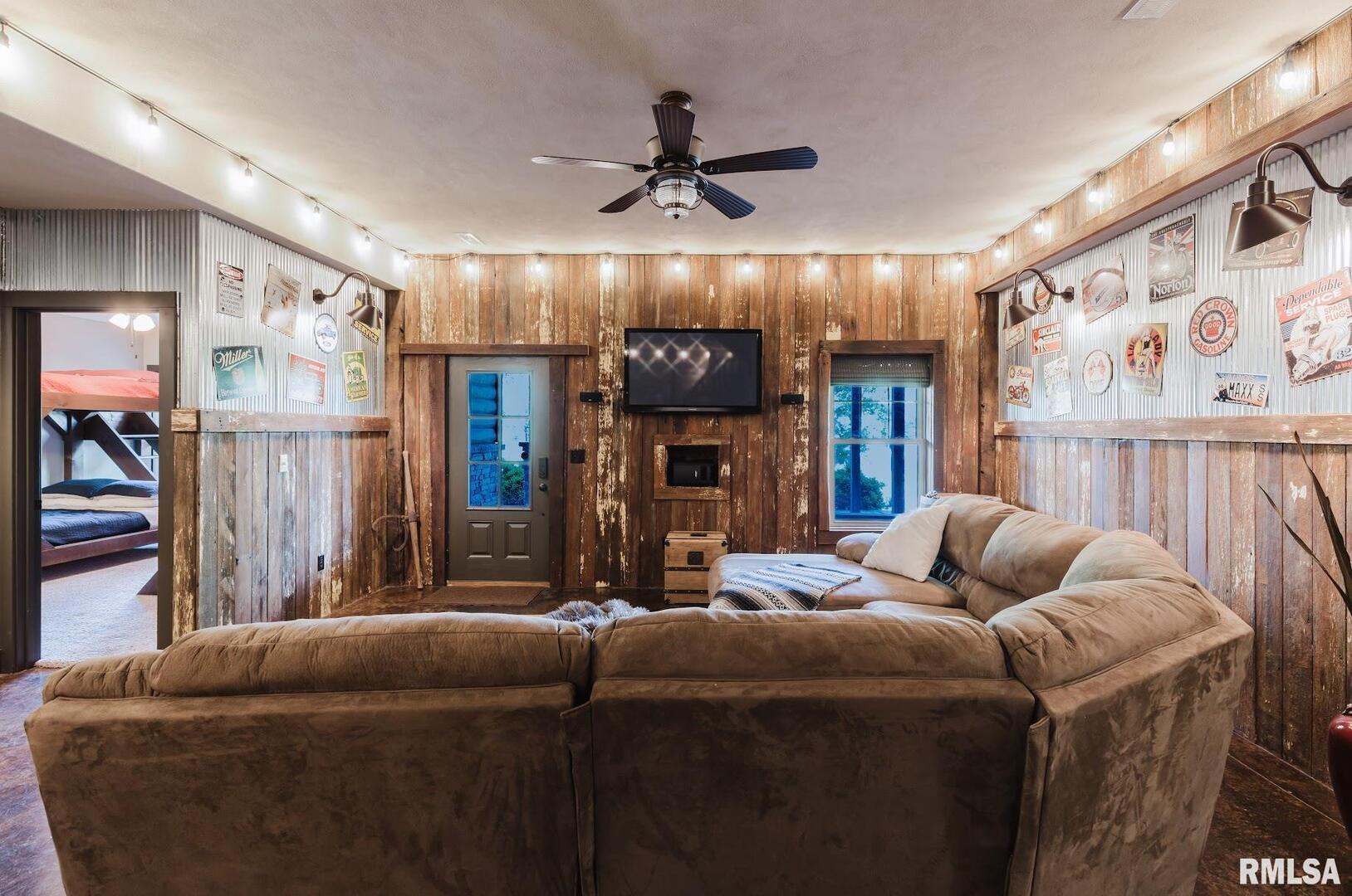 3525 Parrish Ridge Lane Goreville, IL 62939 - Photo 55 of 86 a living room with furniture and a chandelier