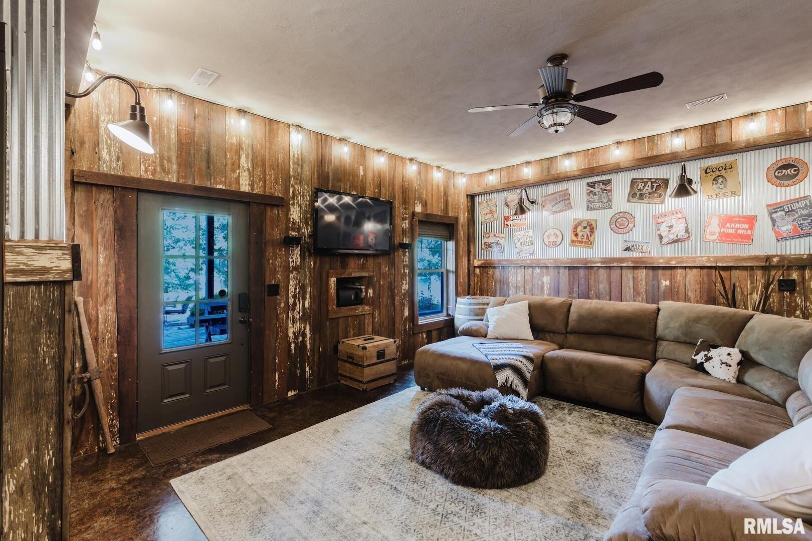 3525 Parrish Ridge Lane Goreville, IL 62939 - Photo 60 of 86 a living room with furniture and a fireplace