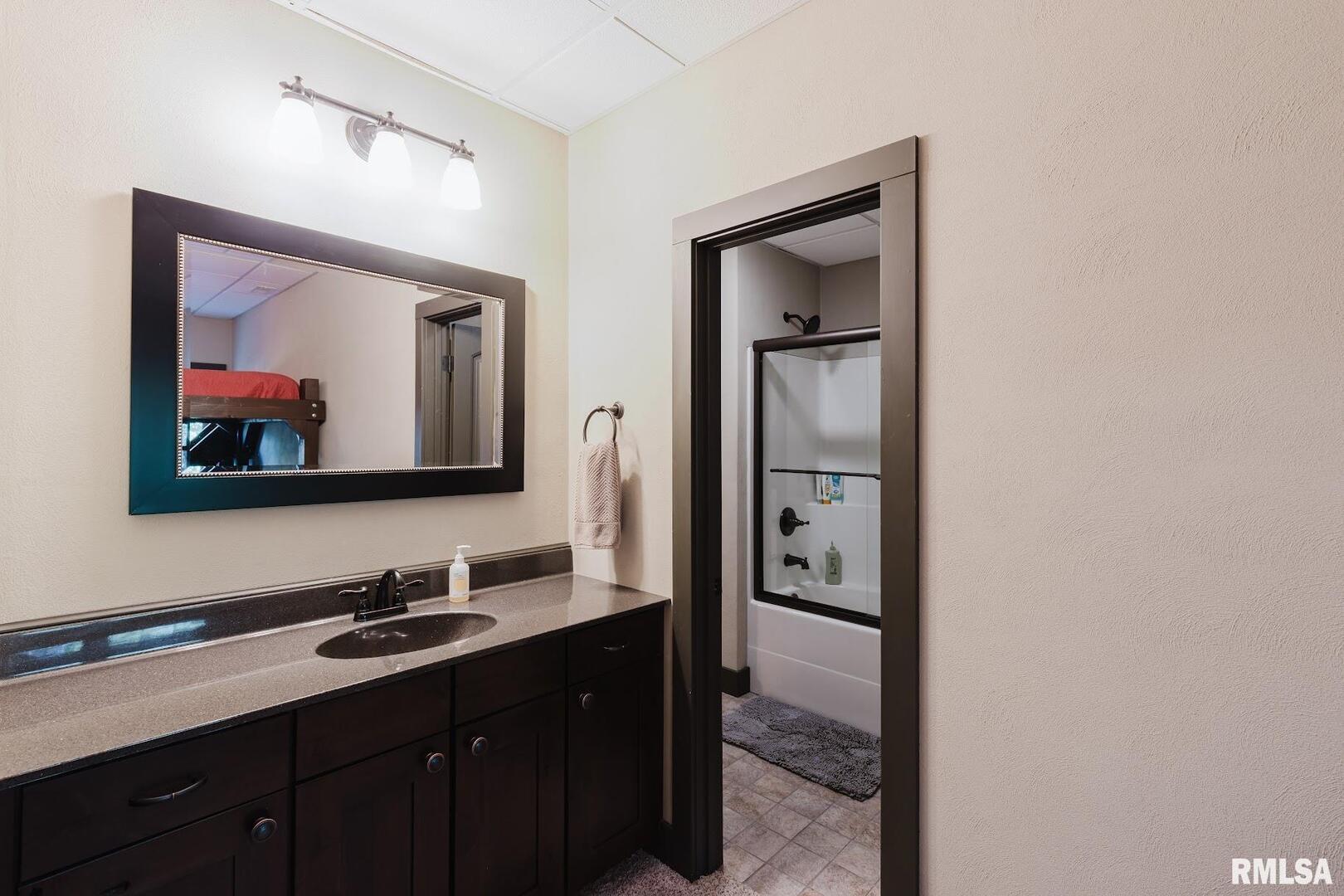 3525 Parrish Ridge Lane Goreville, IL 62939 - Photo 65 of 86 a bathroom with a toilet sink and mirror