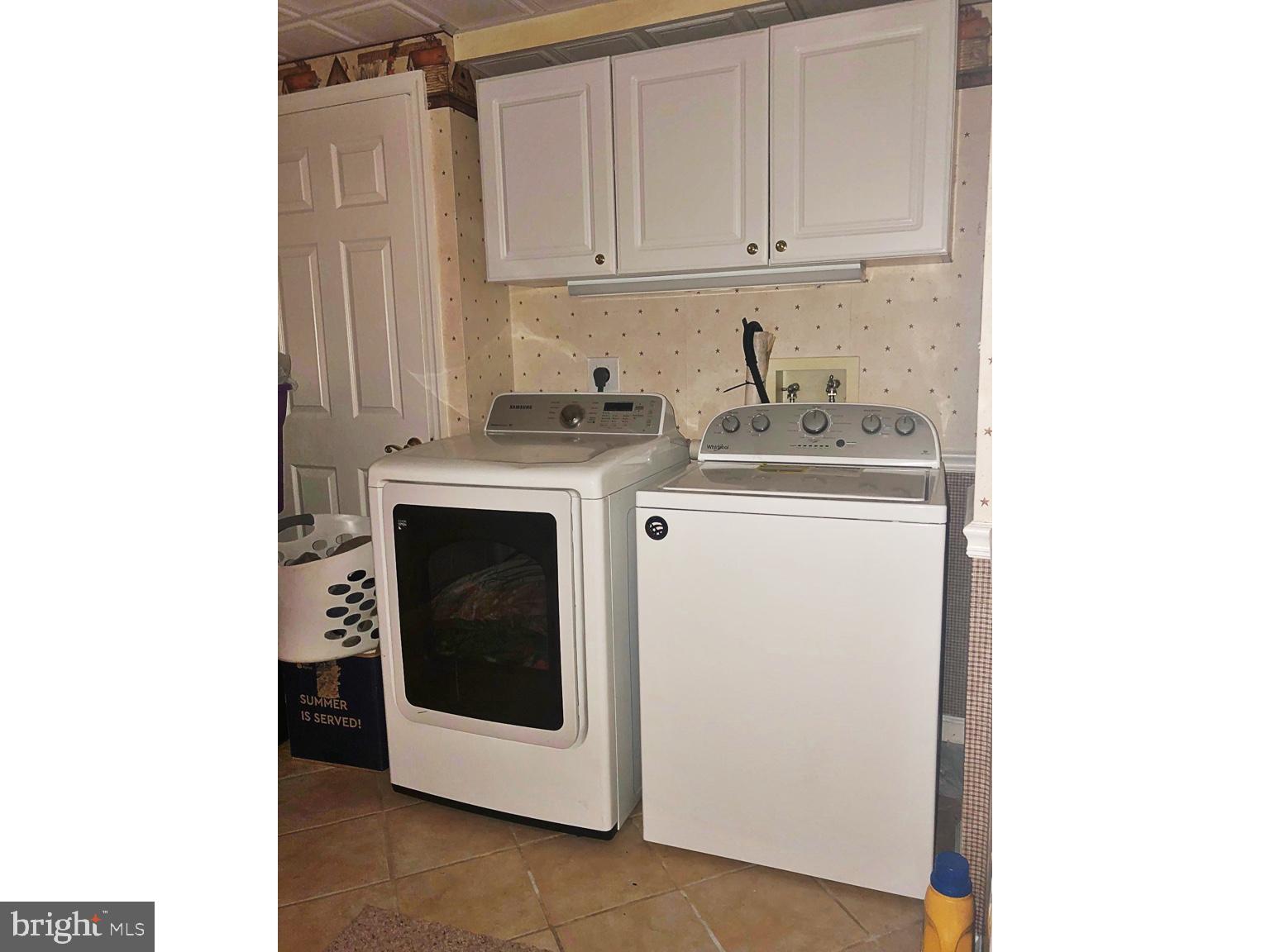 4 Dovetree Drive Newark, DE 19713 - Photo 13 of 14 a utility room with dryer and washer