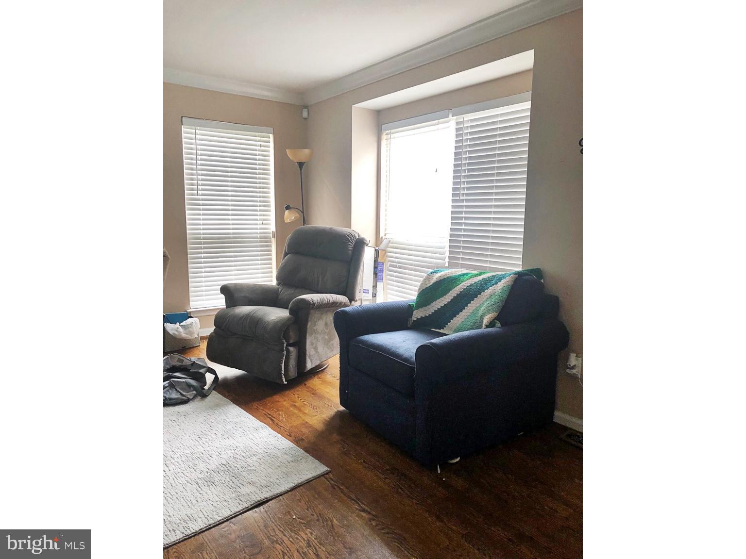 4 Dovetree Drive Newark, DE 19713 - Photo 3 of 14 a living room with furniture and a window