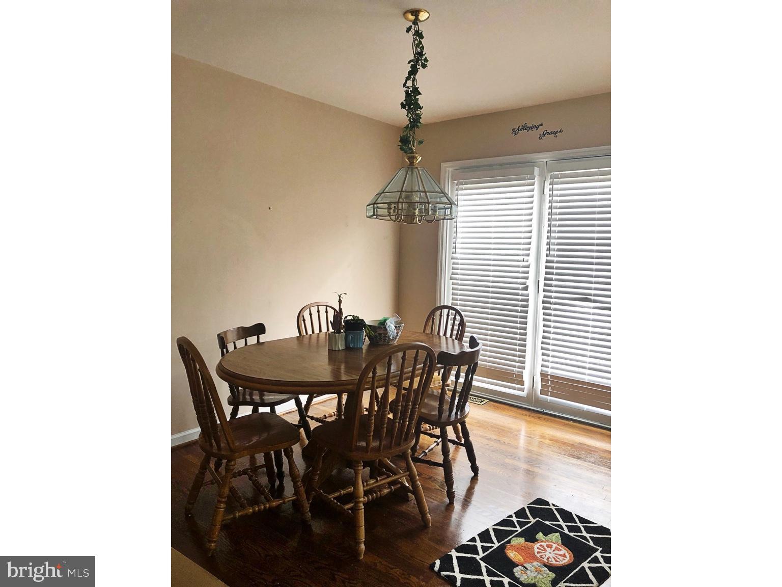 4 Dovetree Drive Newark, DE 19713 - Photo 5 of 14 a view of a dining room with furniture and window