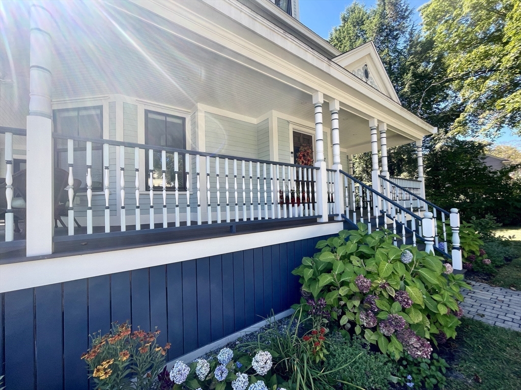 247 Main Street Groton, MA 01450 - Photo 2 of 42 a view of a house with wooden fence