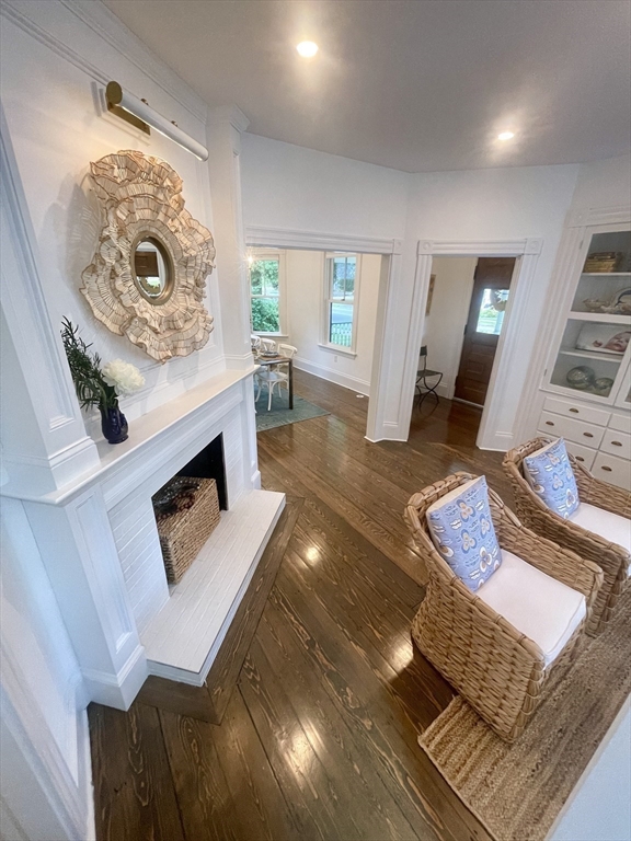 247 Main Street Groton, MA 01450 - Photo 24 of 42 a living room with furniture and a fireplace