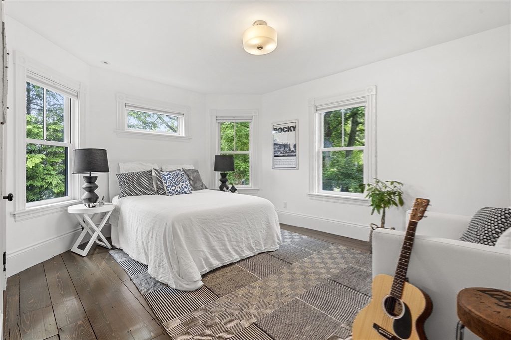247 Main Street Groton, MA 01450 - Photo 29 of 42 a bedroom with a bed and a window