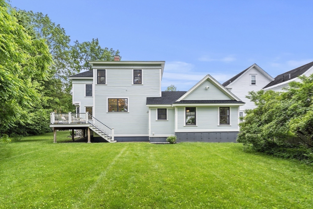 247 Main Street Groton, MA 01450 - Photo 40 of 42 a view of a house with a yard