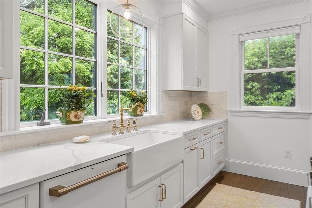 247 Main Street Groton, MA 01450 - Photo 8 of 42 a kitchen with a sink and large window