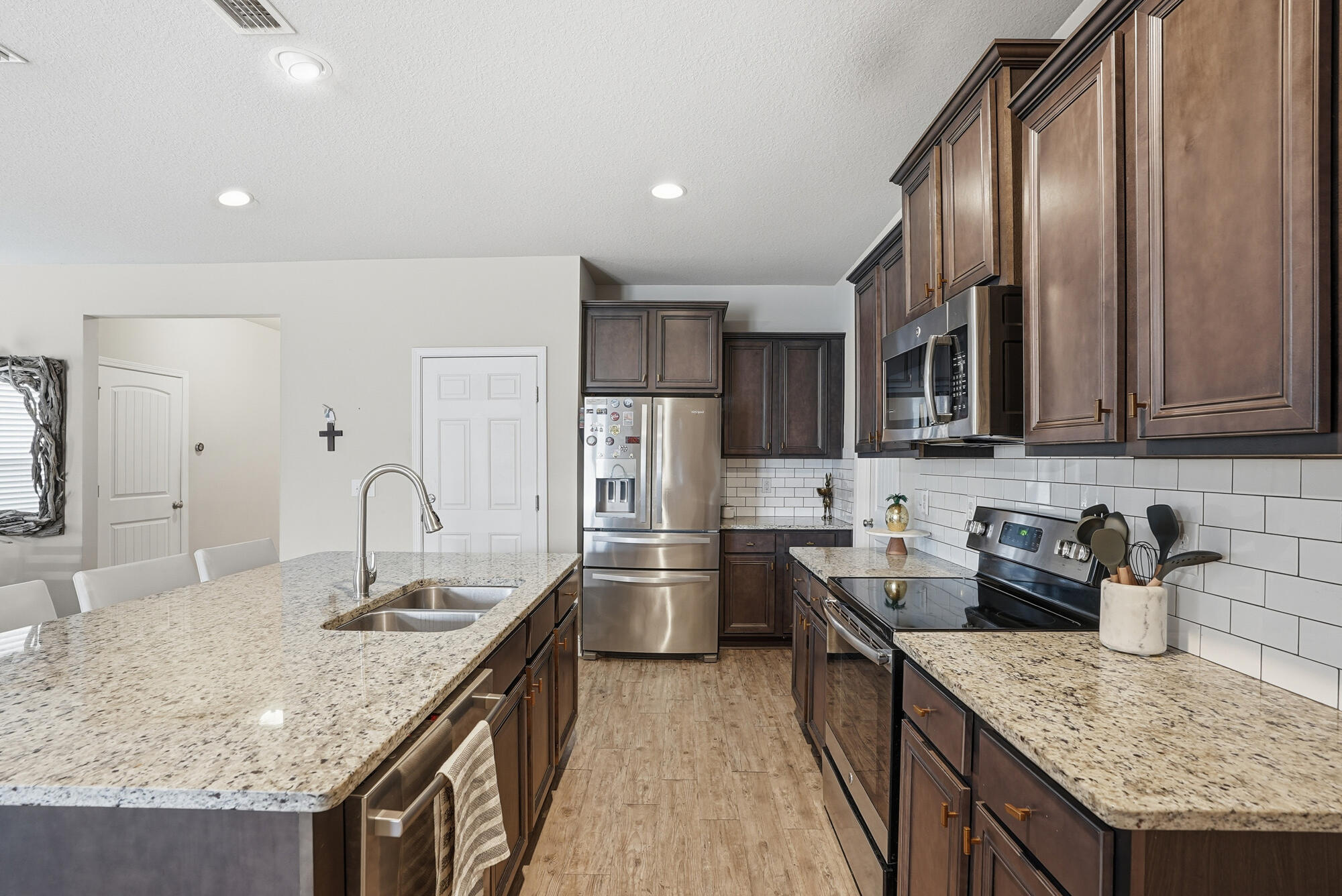 88 Marsh Landing South Freeport, FL 32439 - Photo 19 of 48 a kitchen with stainless steel appliances granite countertop a sink stove and refrigerator