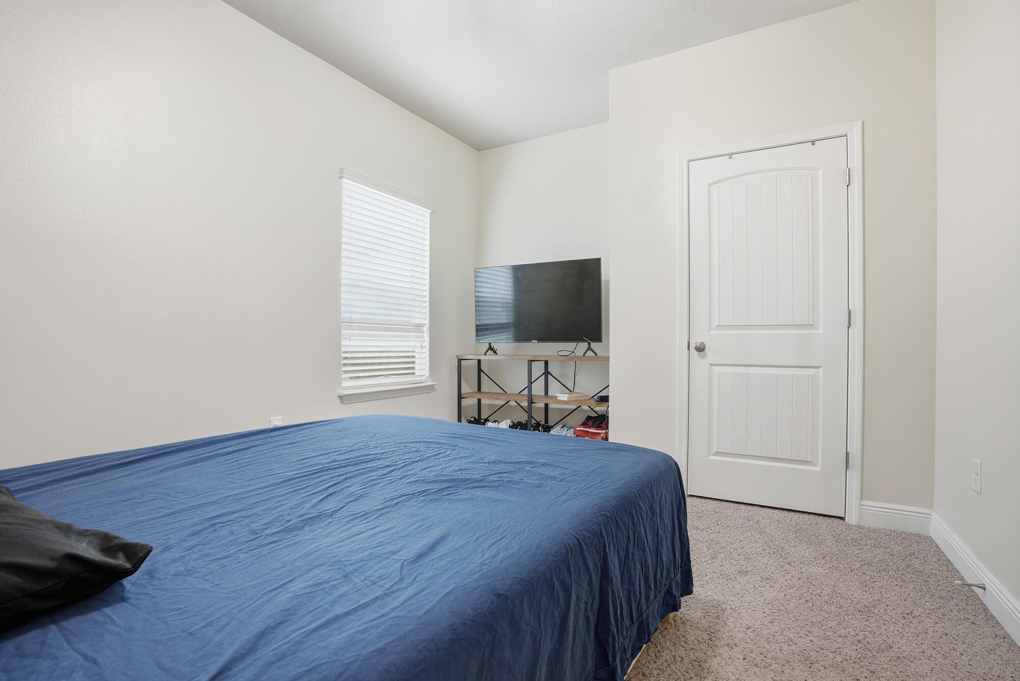 88 Marsh Landing South Freeport, FL 32439 - Photo 20 of 48 a bedroom with a bed and a flat screen tv