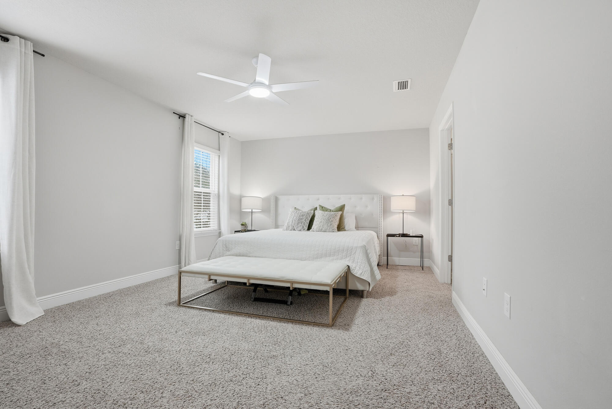 88 Marsh Landing South Freeport, FL 32439 - Photo 26 of 48 a bedroom with a bed and a night stand