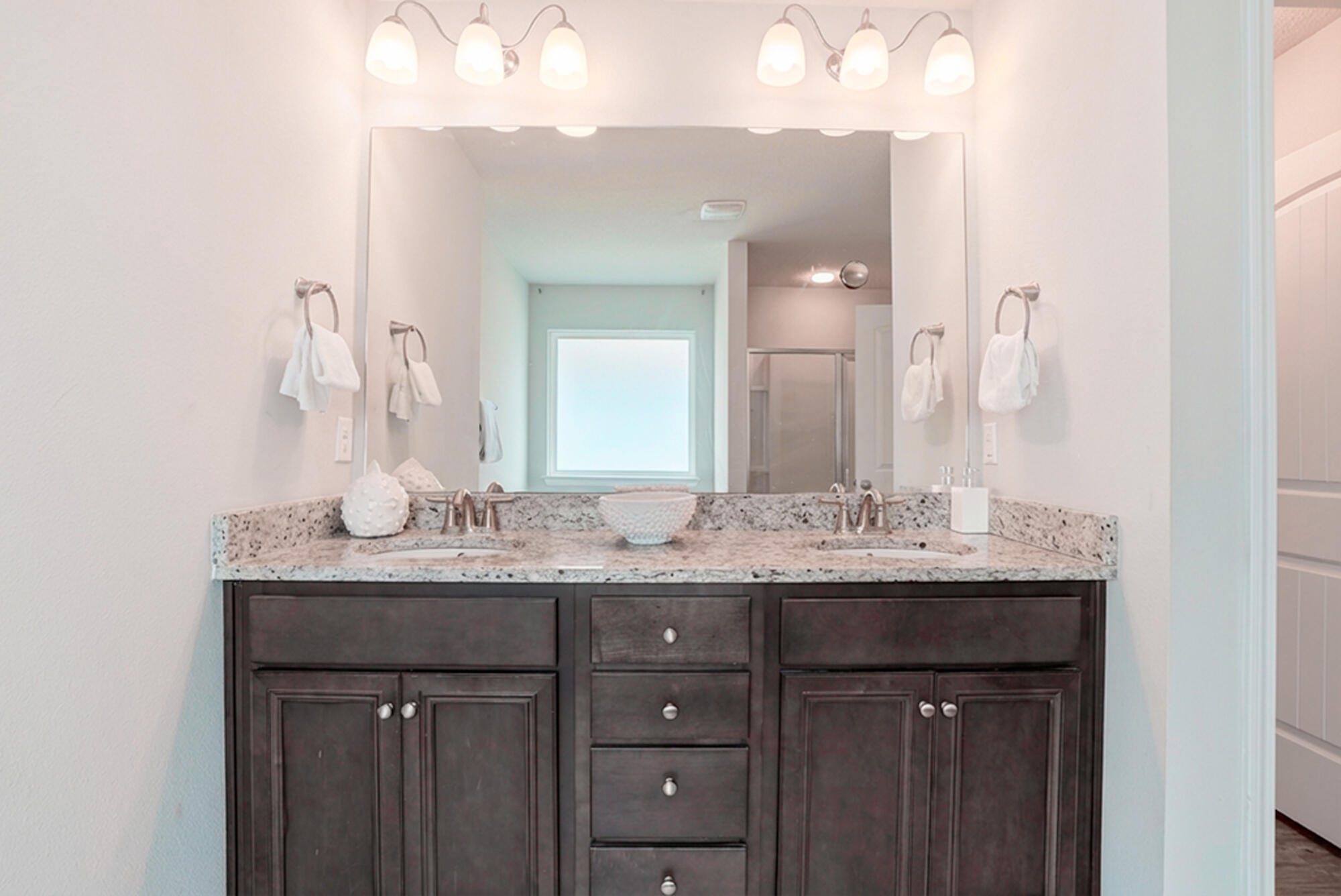 88 Marsh Landing South Freeport, FL 32439 - Photo 31 of 48 a bathroom with a granite countertop sink and a mirror