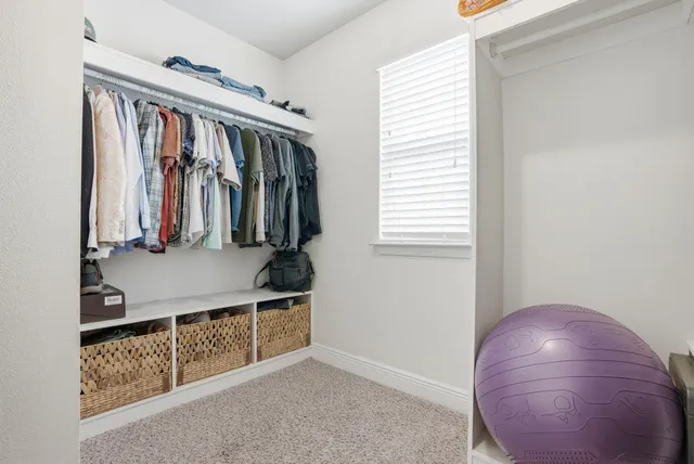a room with a walk in closet