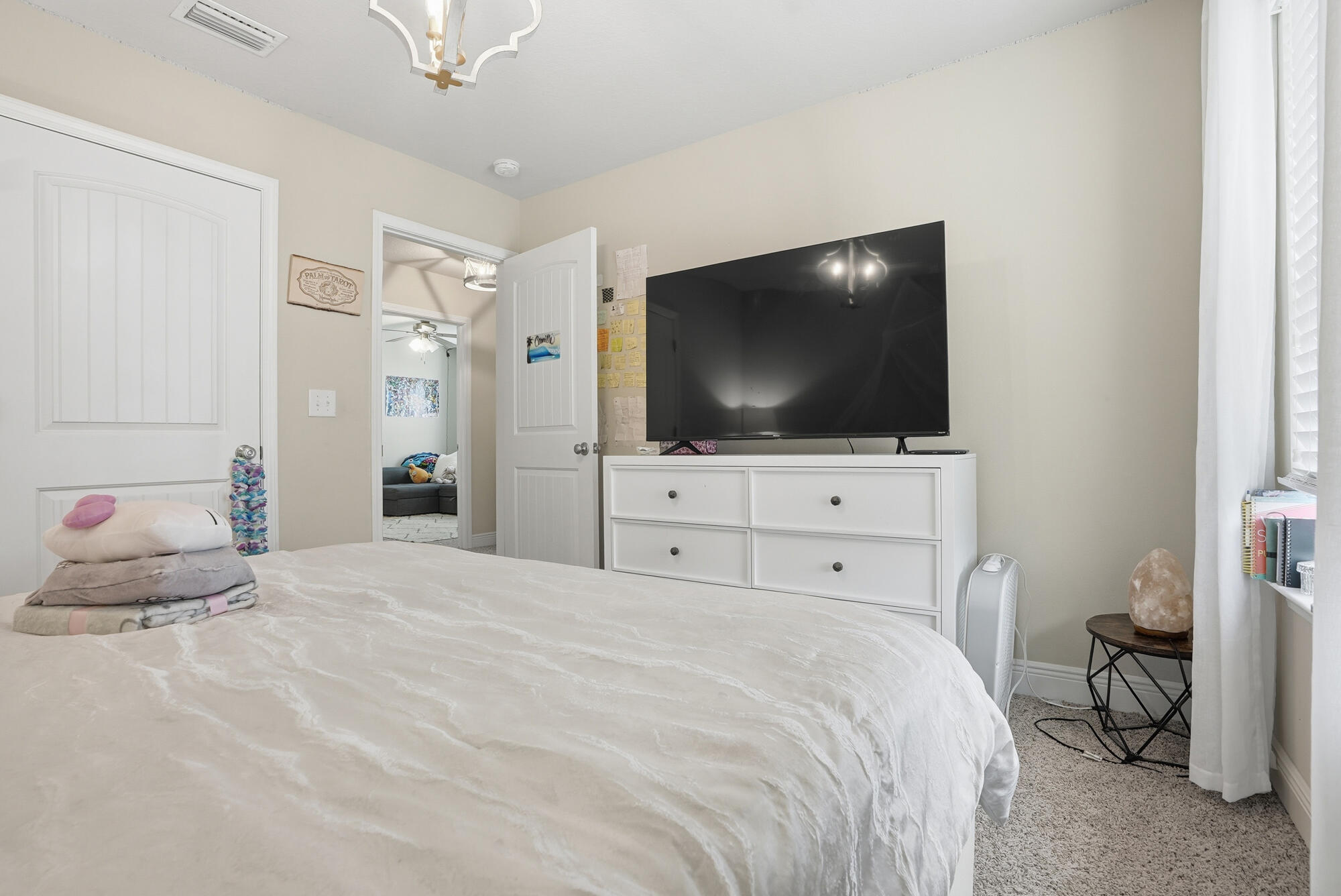 88 Marsh Landing South Freeport, FL 32439 - Photo 37 of 48 a bedroom with a bed and a flat screen tv