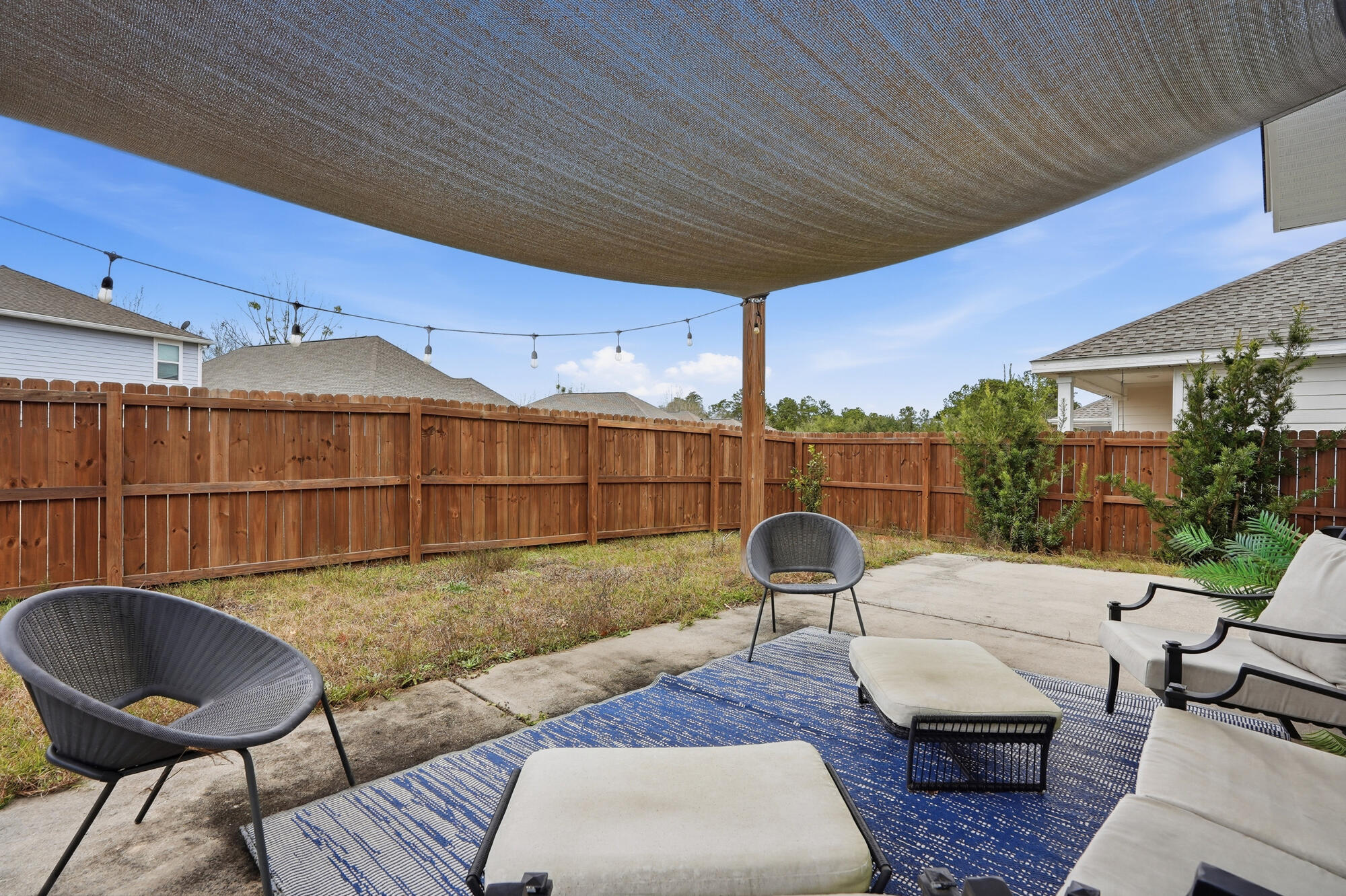88 Marsh Landing South Freeport, FL 32439 - Photo 45 of 48 a outdoor space with patio couch and a potted plant