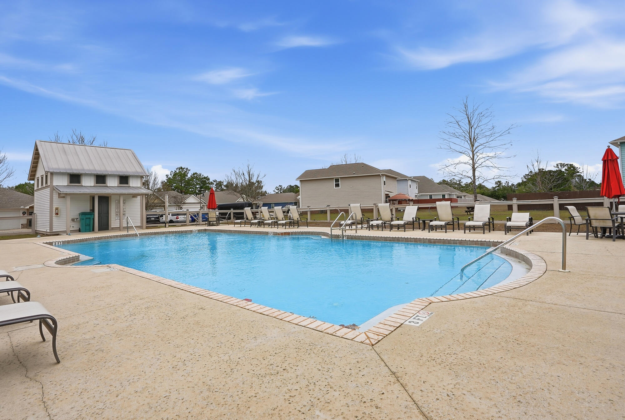 88 Marsh Landing South Freeport, FL 32439 - Photo 5 of 48 a view of a swimming pool with a chairs
