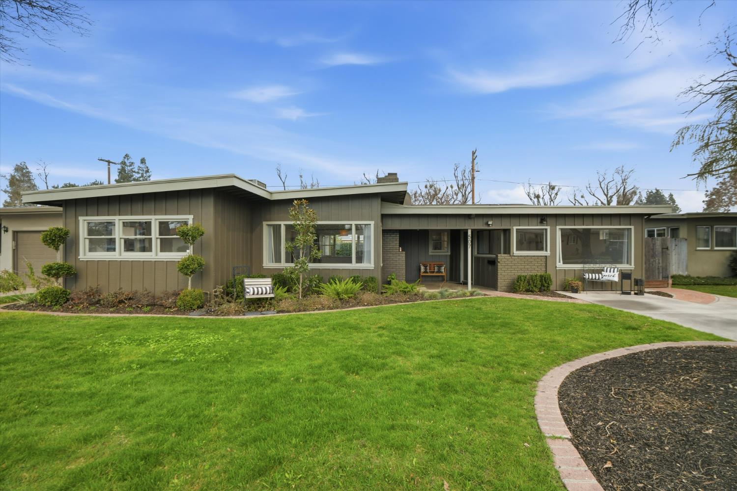 507 Coronado Way Modesto, CA 95350 - Photo 1 of 1 a view of a house with a yard and sitting area