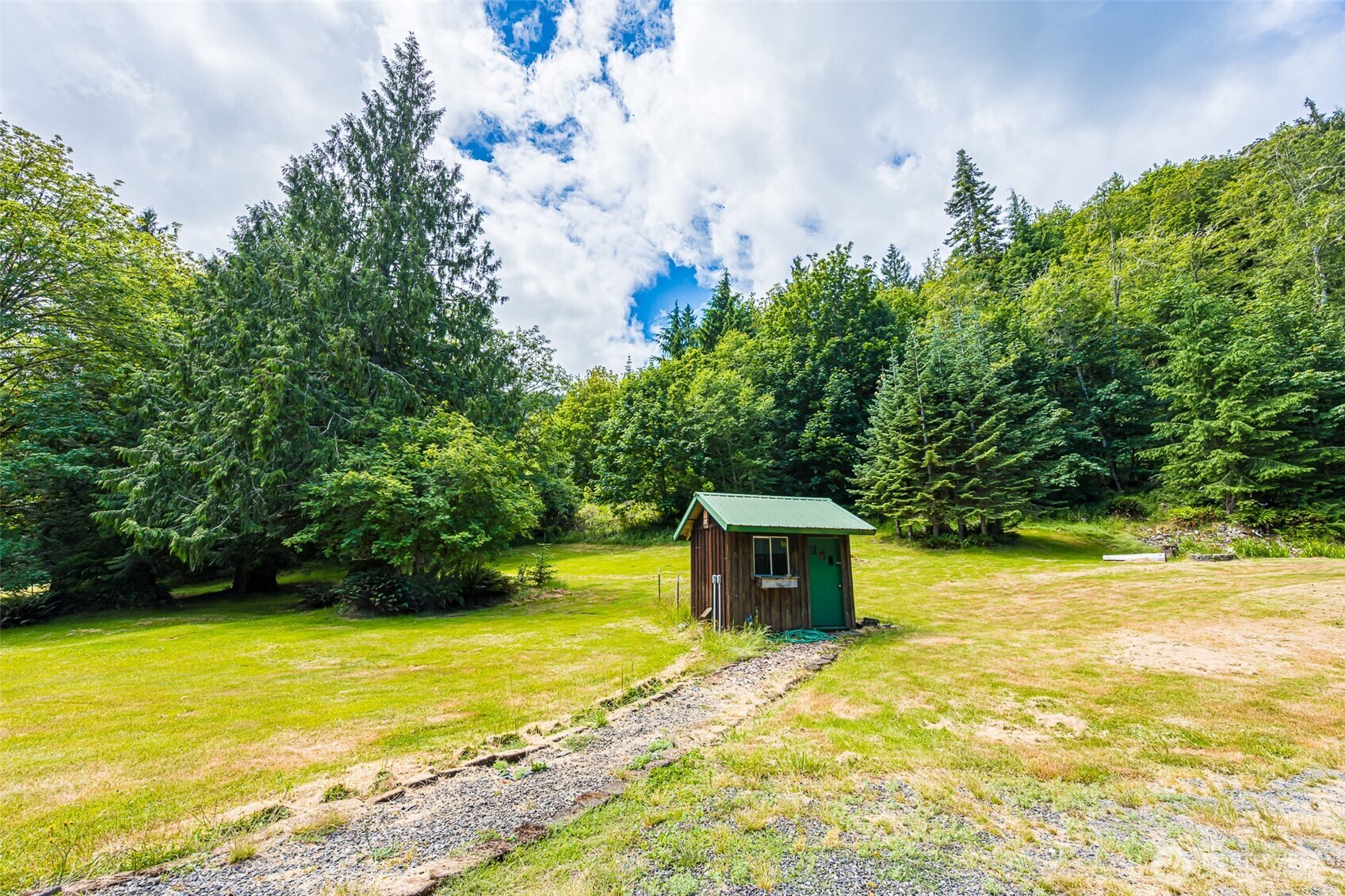 1422 Grauel-Ramapo Road Port Angeles, WA 98363 - Photo 35 of 40 a view of a swimming pool with an outdoor space