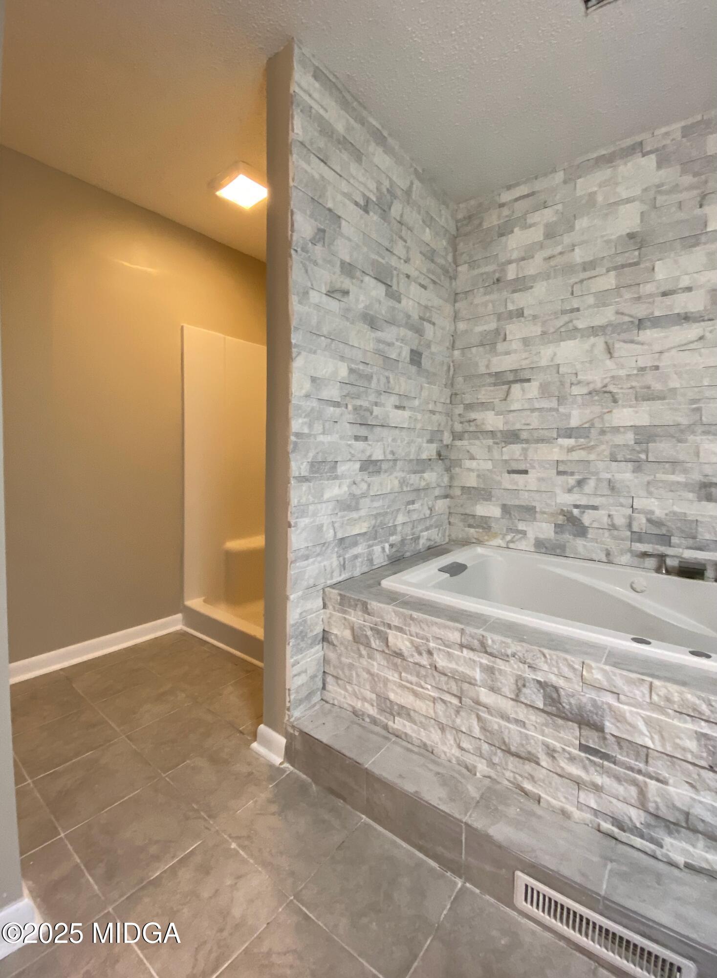 117 Laura Lane Fort Valley, GA 31030 - Photo 15 of 31 a bathroom with a shower