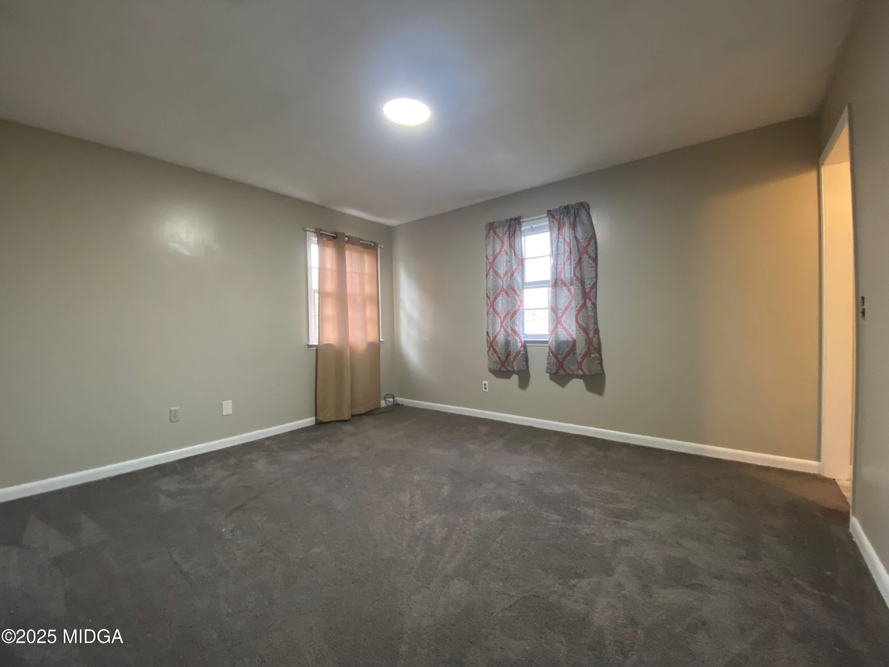 117 Laura Lane Fort Valley, GA 31030 - Photo 18 of 31 an empty room with windows