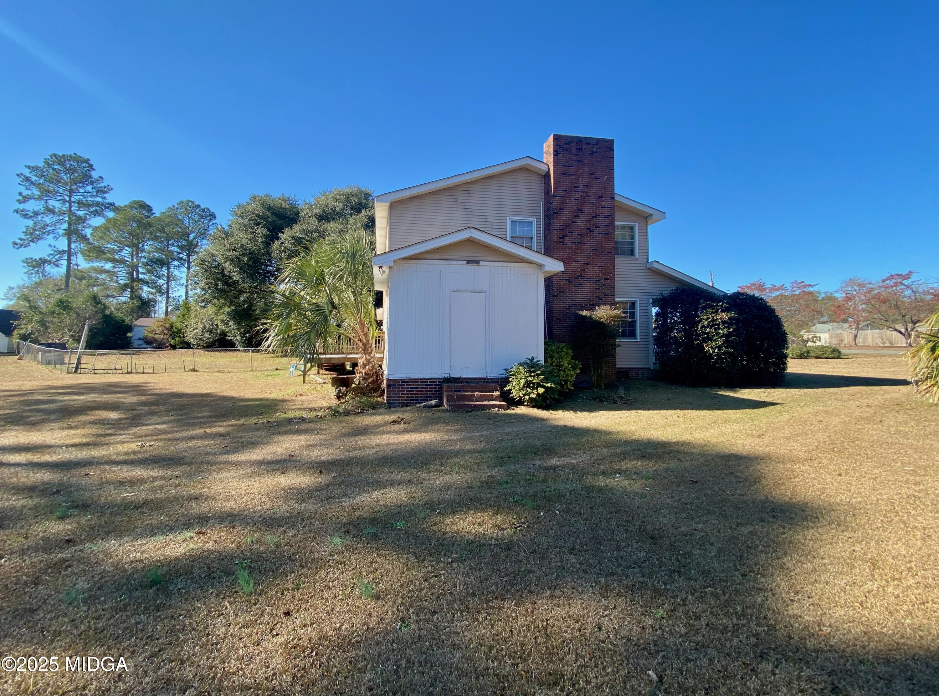 117 Laura Lane Fort Valley, GA 31030 - Photo 25 of 31 a view of a house with a yard