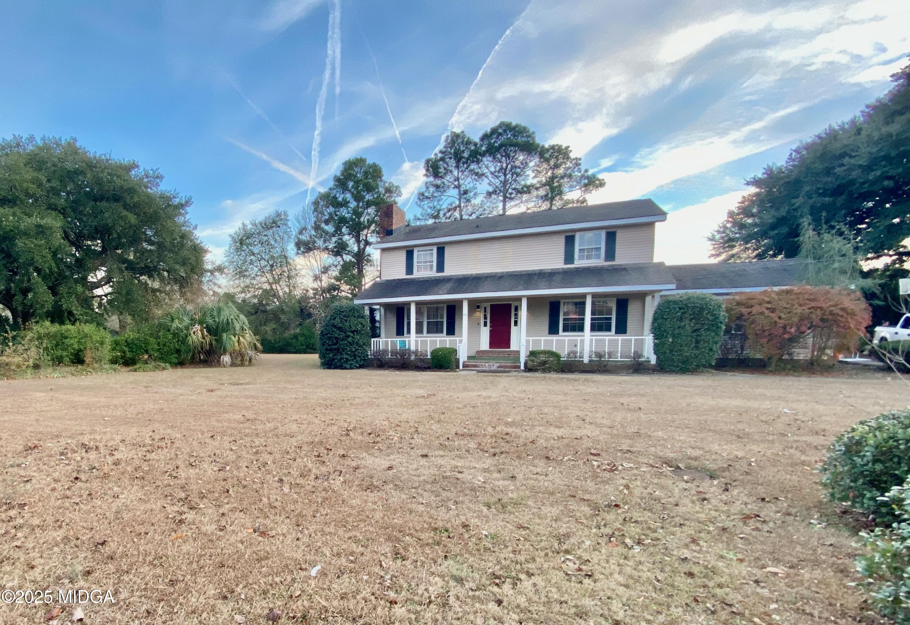 117 Laura Lane Fort Valley, GA 31030 - Photo 29 of 31 a front view of a house with a garden