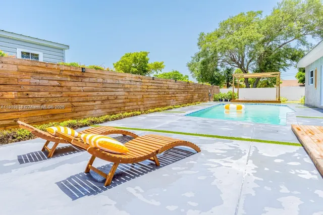 a view of an outdoor space and swimming pool